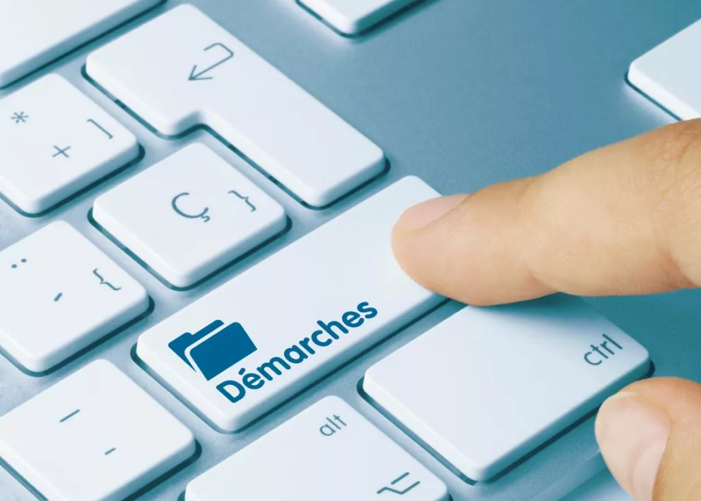 Clavier avec touche « Démarches » symbolisant l’accès en ligne à la Banque-Carrefour des Entreprises (BCE) en Belgique.